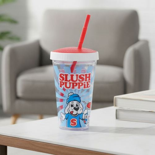 Slush Puppie cup with a straw on a table in a living room setting