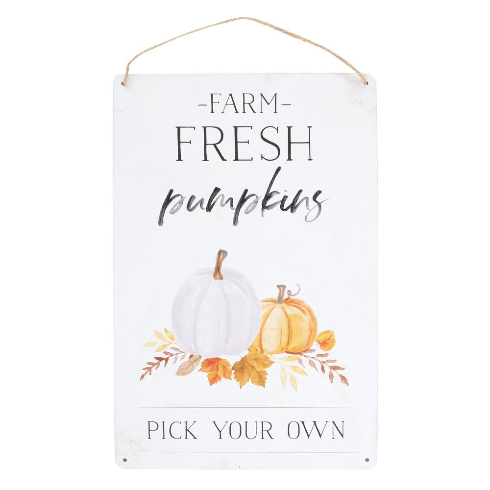 Decorative sign with 'Farm Fresh Pumpkins' text and pumpkins on a white background