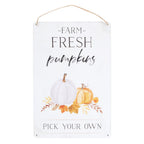 Decorative sign with 'Farm Fresh Pumpkins' text and pumpkins on a white background