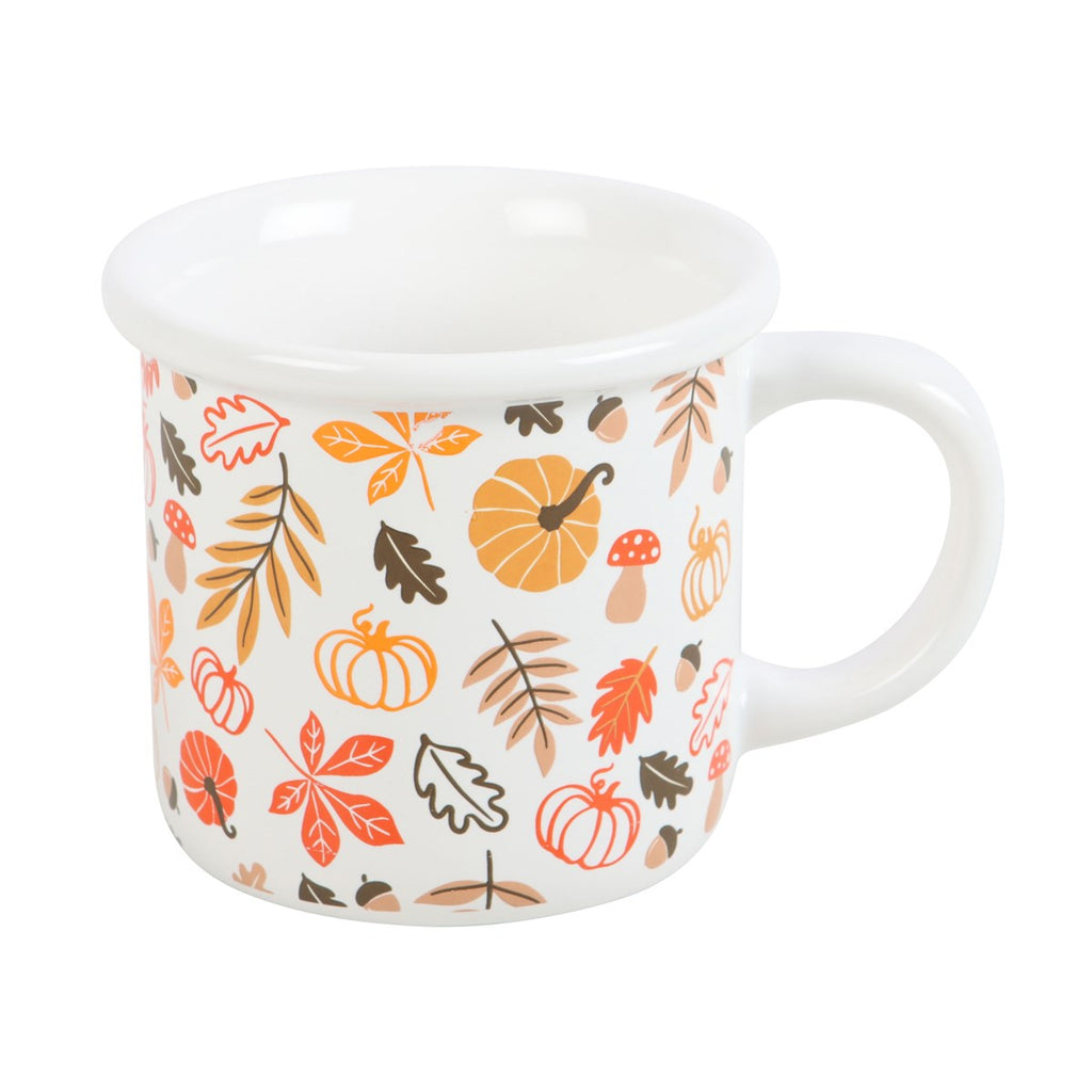 White mug with autumn-themed pattern on a white background