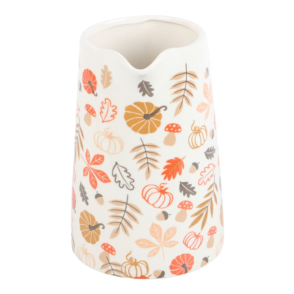 Decorative jug vase with autumn leaf and pumpkin pattern on a white background