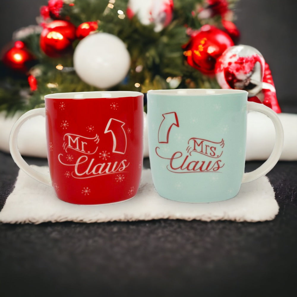 A set of two mugs, one red and one green, with 'Mr & Mrs Claus' text