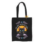 Black tote bag with a cat graphic and text 'In My Witch Era' on a white background