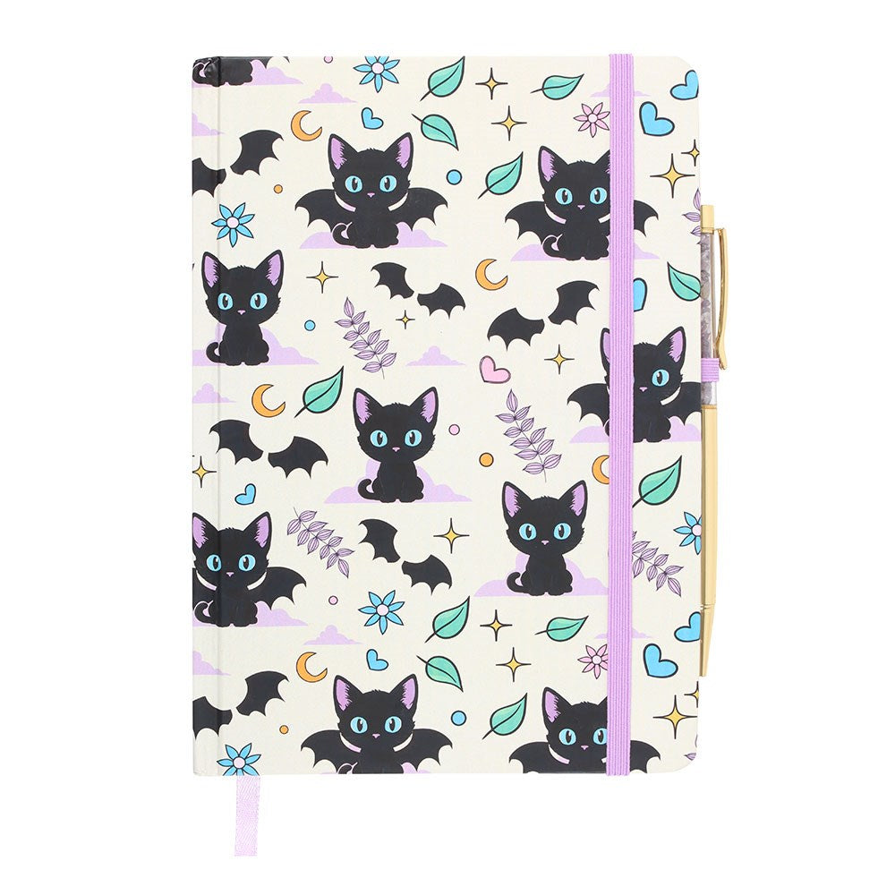 Notebook with black cat bat pattern on a white background