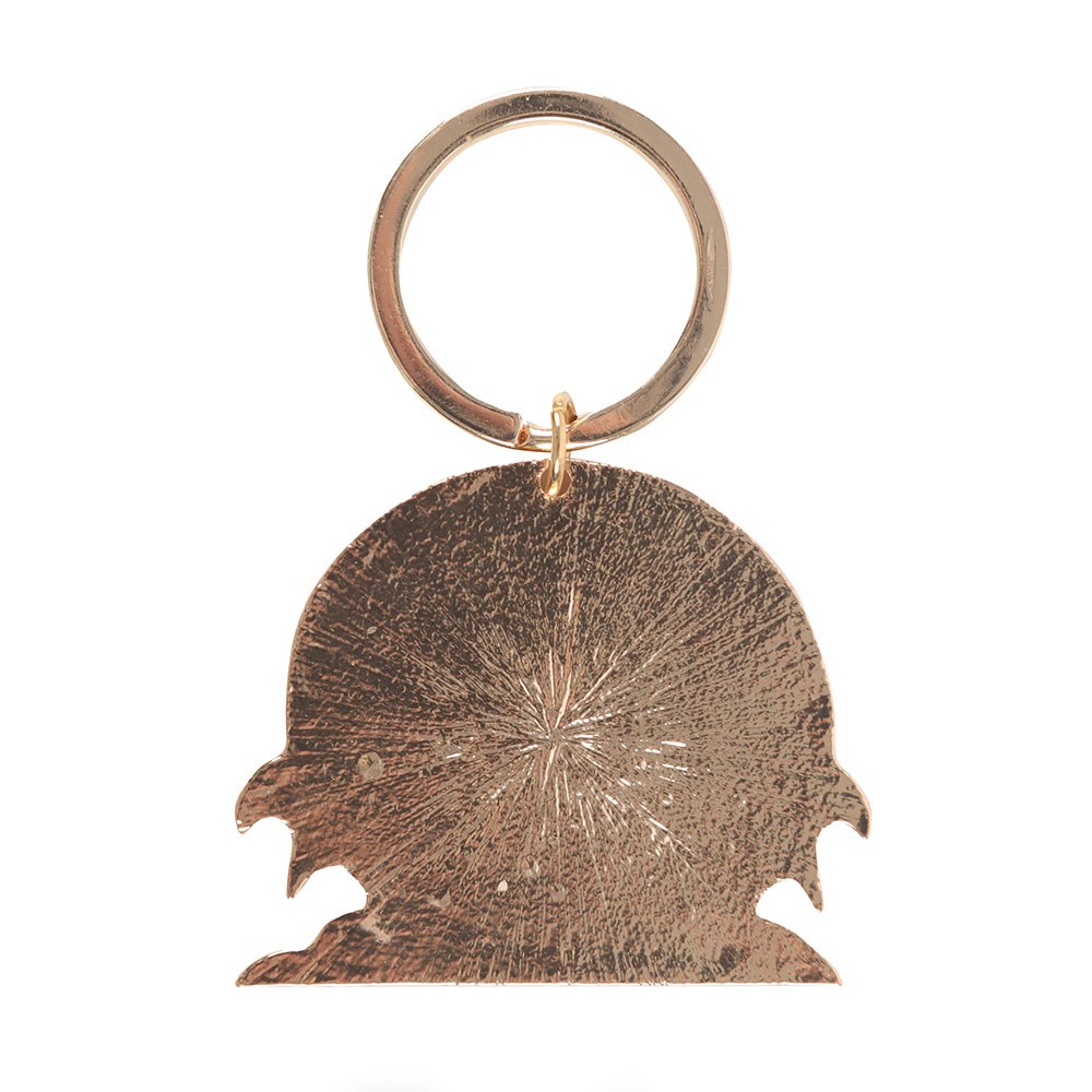 Bronze-colored back keychain with a unique design on a white background