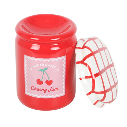 oil burner shaped like a Red jam jar with cherry design and plaid pattern on lid against a white background