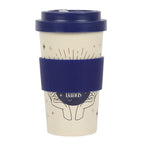 Travel mug with navy lid and sleeve on a white background