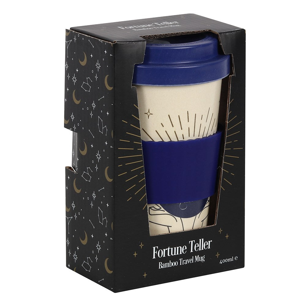 Bamboo travel mug with blue lid in packaging featuring star and moon designs.