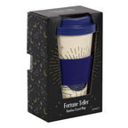 Bamboo travel mug with blue lid in packaging featuring star and moon designs.