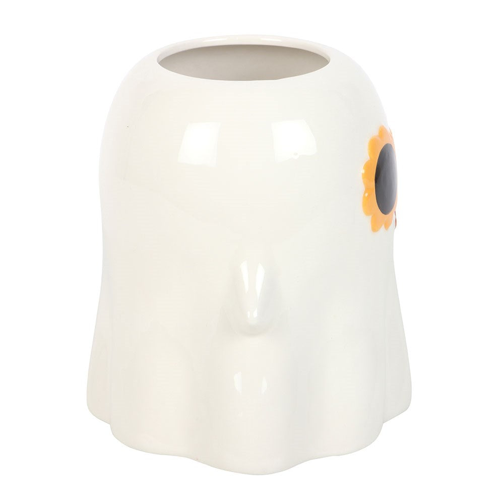 White ceramic vase with a sunflower glasses design on a white background