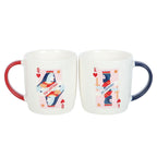 Two mugs with playing card designs on a white background