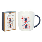 Mug with 'King of Our Hearts' design and playing card box on a white background