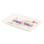Rectangular white ceramic catch all plate with colourful king design on a white background