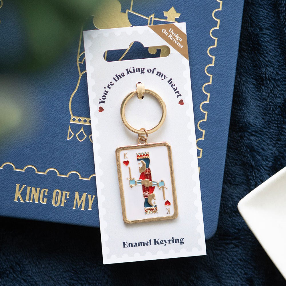 Enamel keyring with 'King of My Heart' text on a backing card