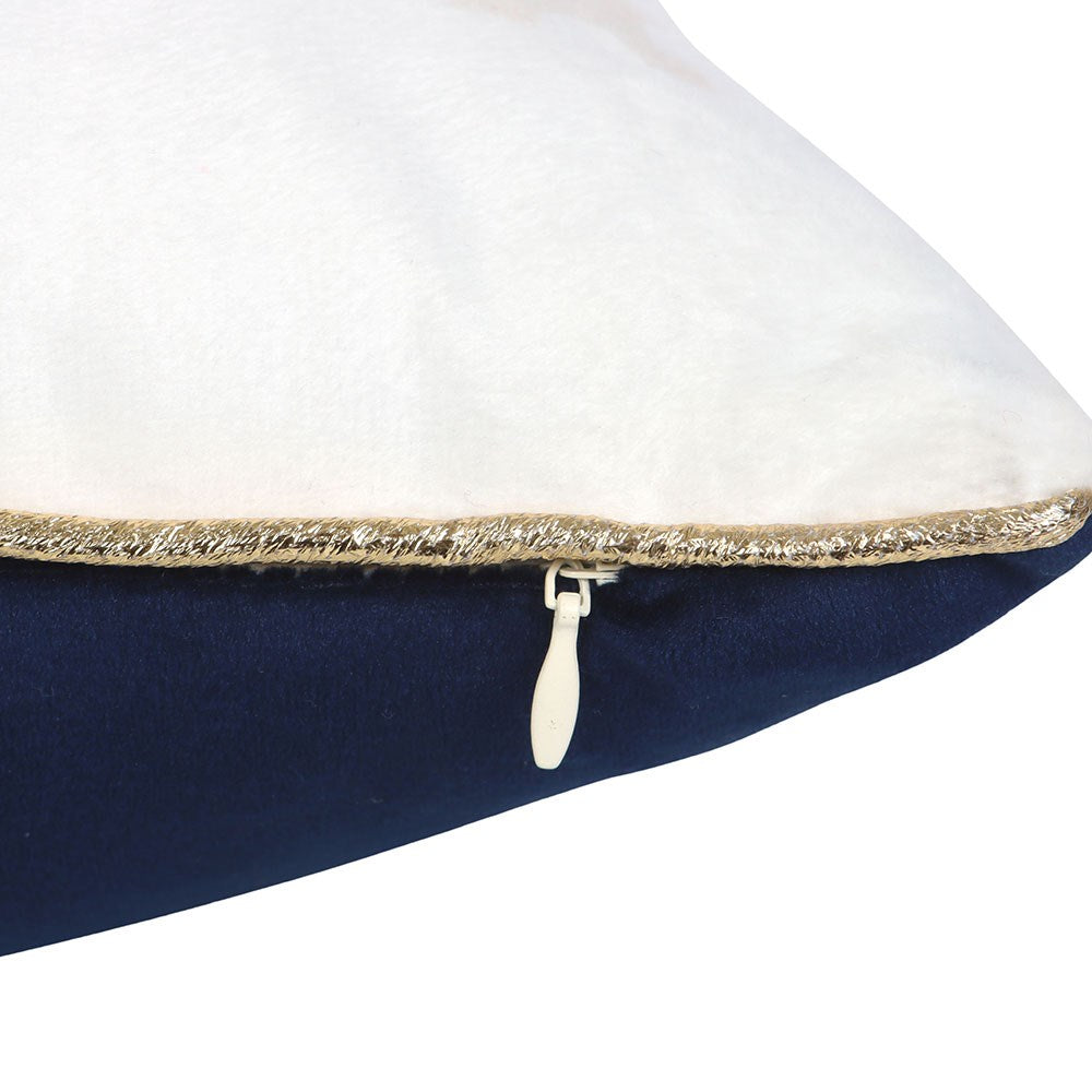 Close-up of a pillow with a gold trim and zipper on a white background