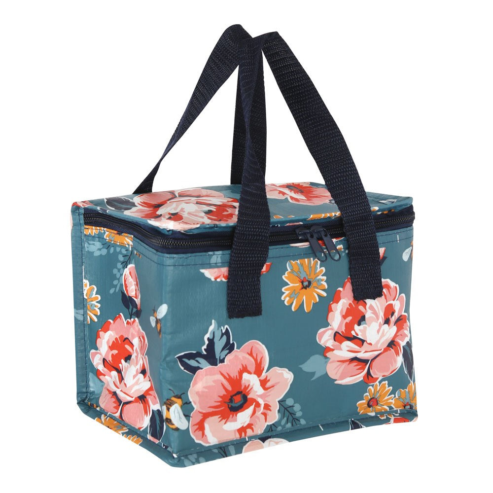 Floral and bee patterned cooler bag with navy handles on a white background