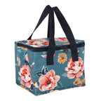 Floral and bee patterned cooler bag with navy handles on a white background