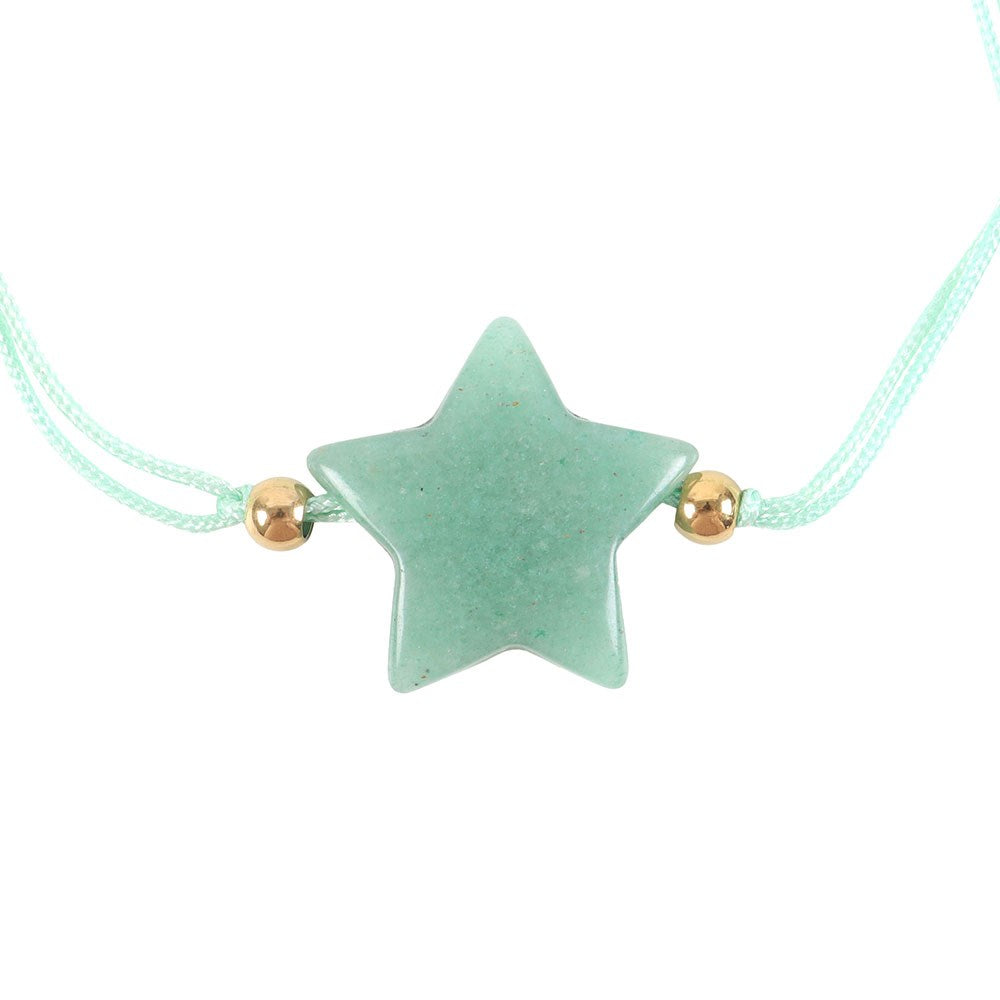 Star-shaped charm on a light blue cord with gold beads against a white background