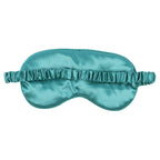 Teal sleep mask on a white background
