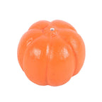 Orange pumpkin-shaped incense stick holder on a white background
