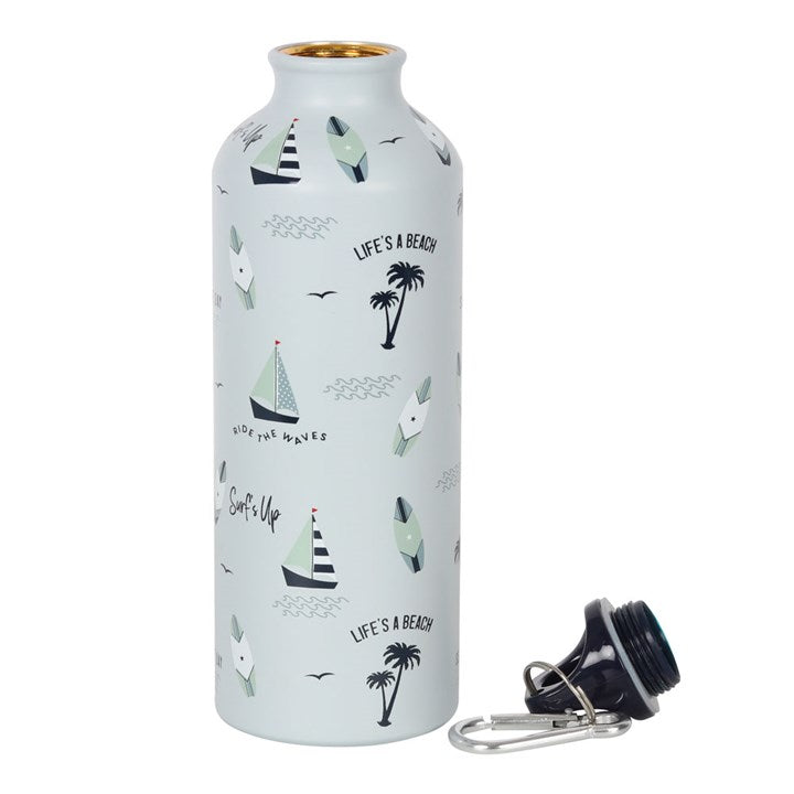 the lid off of the beach themed water bottle that's pastel blue coloured with surfboards and sail boats on it