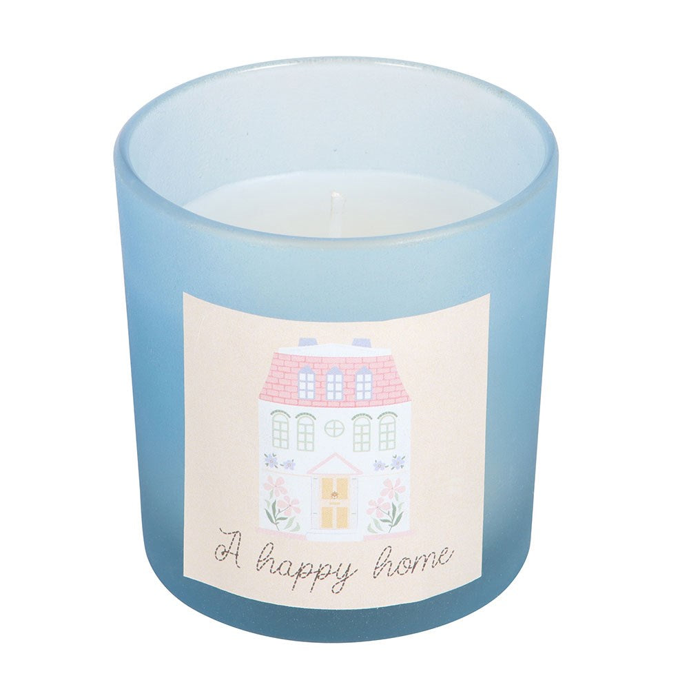 Candle with a house illustration and 'A happy home' text on a white background