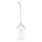 Decorative hanging object with 'Our happy place' text on a white background