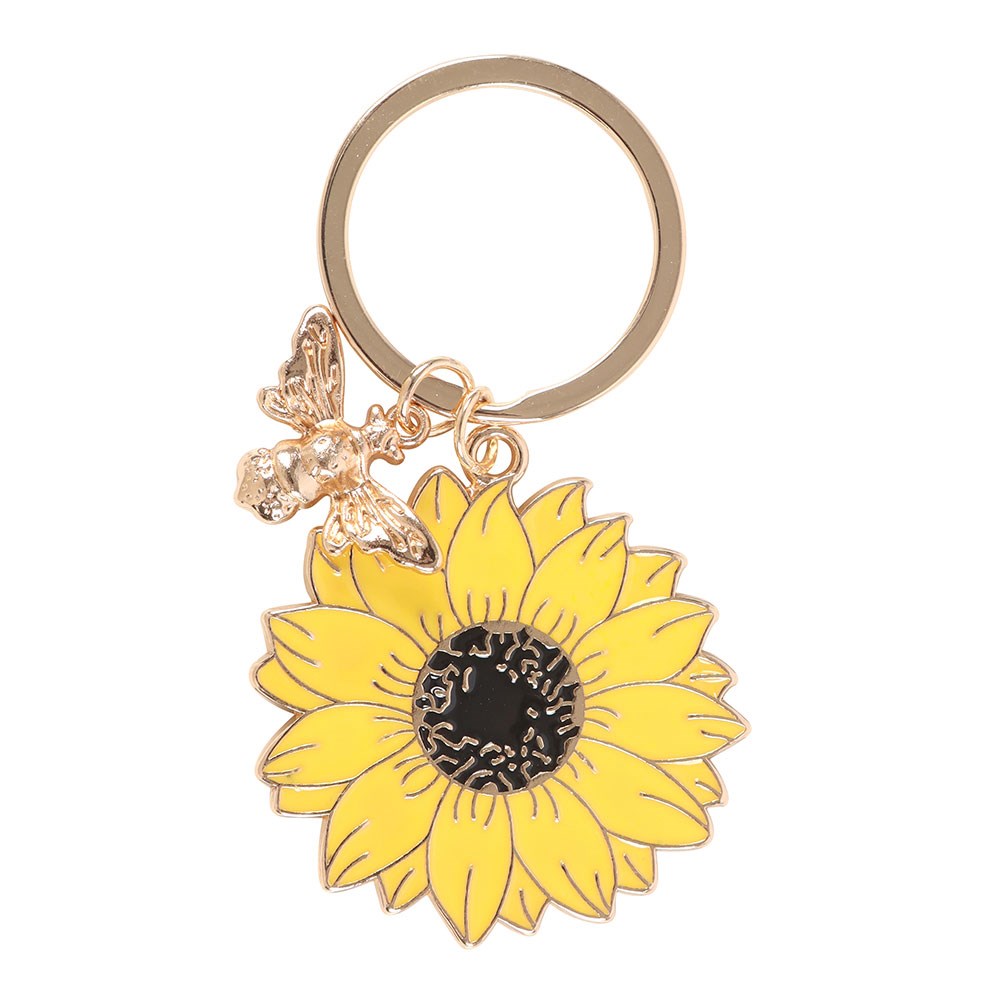 Yellow sunflower keychain with a bee charm on a white background