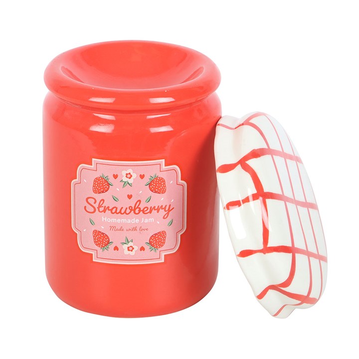 Red jar oil burner with a strawberry-themed label and checkered lid on a white background