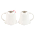 Two white ghost shaped ceramic mugs on a white background