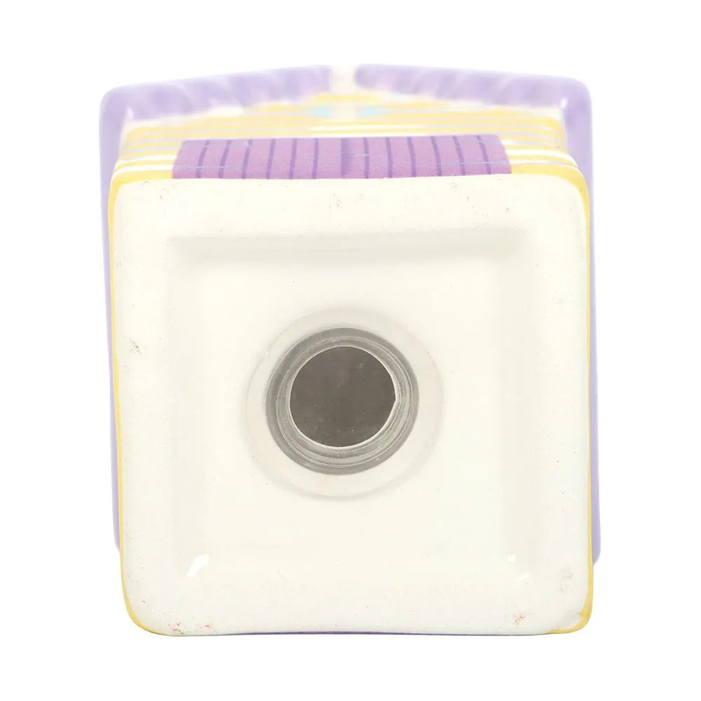 pastel beach hut salt and pepper shakers on white base showing refill location