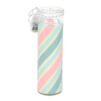 Tube candle with pastel pink and blue striped design on a white background