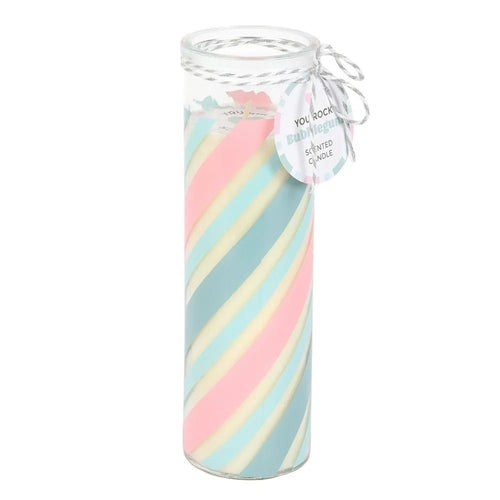 Glass tube candle with pastel pink and blue striped candle and decorative tag on a white background