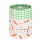 Scented candle container with carrot pattern and green checkered lid on a white background
