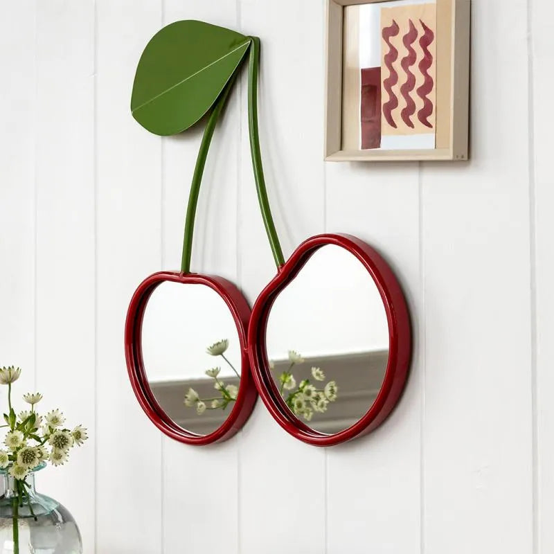 wall mirror shaped like a cherry