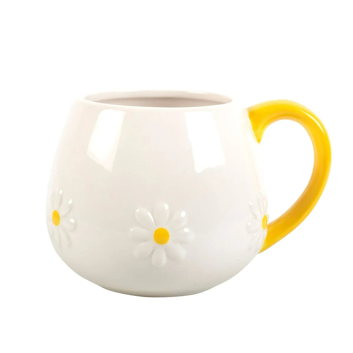 White mug with yellow handle and floral design on a white background