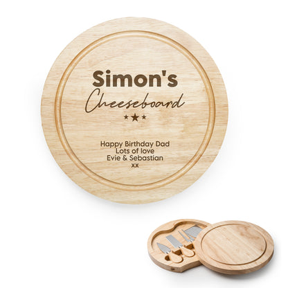 Personalized wooden cheeseboard set with engraved text on a white background