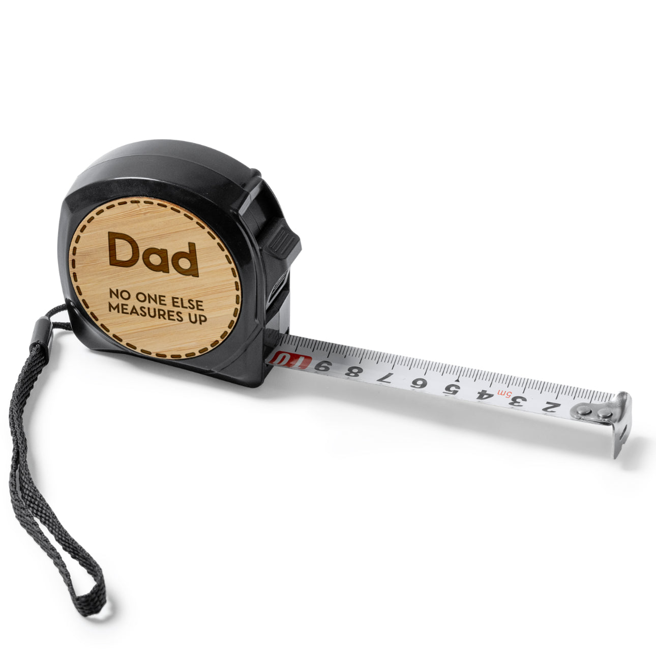 Tape measure with 'Dad' engraving on a white background