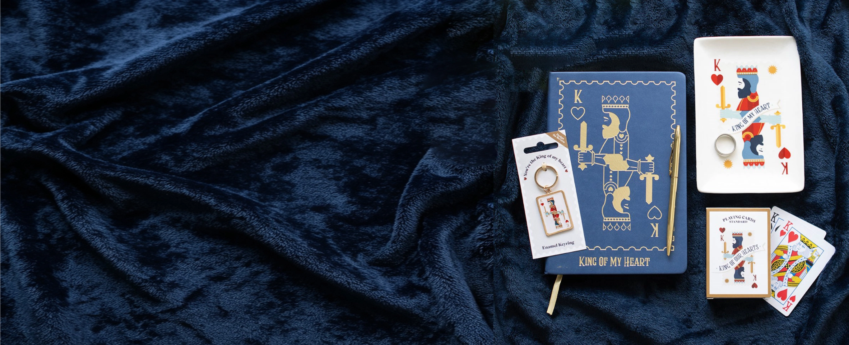 image of fathers day collection of gifts, playing cards, notebook, keyring