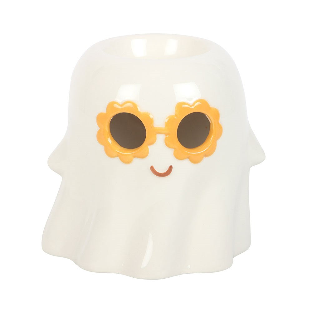 White ghost-shaped oil burner with sunflower sunglasses on a white background