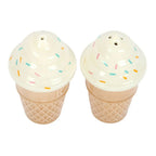 Two ice cream cone-shaped salt and pepper shakers with colorful sprinkles on a white background