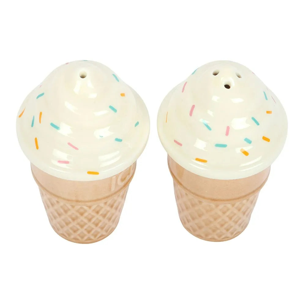 Two ice cream cone-shaped salt and pepper shakers with colorful sprinkles on a white background