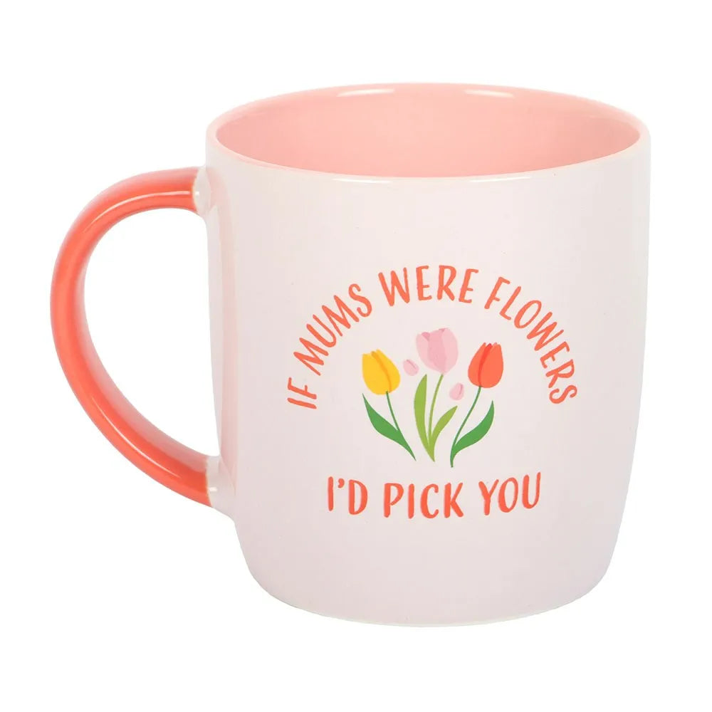 white mug with pink inner and handle and floral design