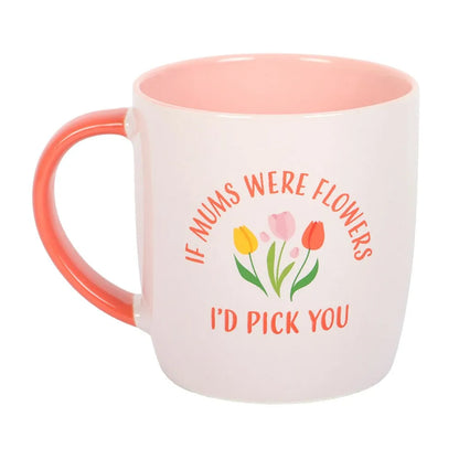 white mug with pink inner and handle and floral design