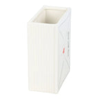 White rectangular vase with a red label on a white background