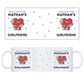 A mug with cartoon character and text 'I'm so lucky to be Nathan's Girlfriend' on a white background.