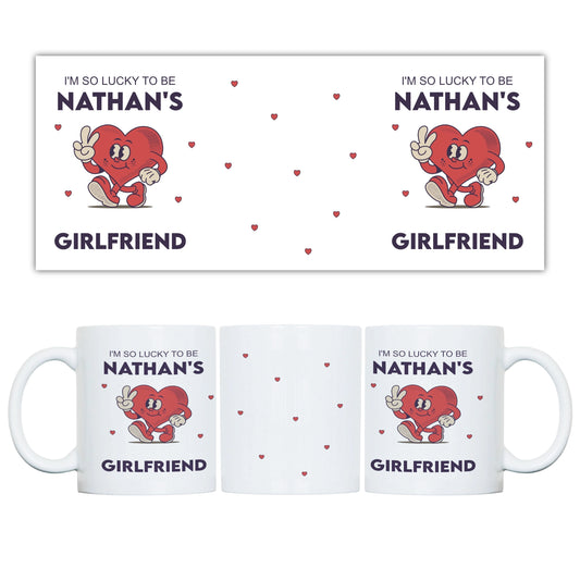 A mug with cartoon character and text 'I'm so lucky to be Nathan's Girlfriend' on a white background.