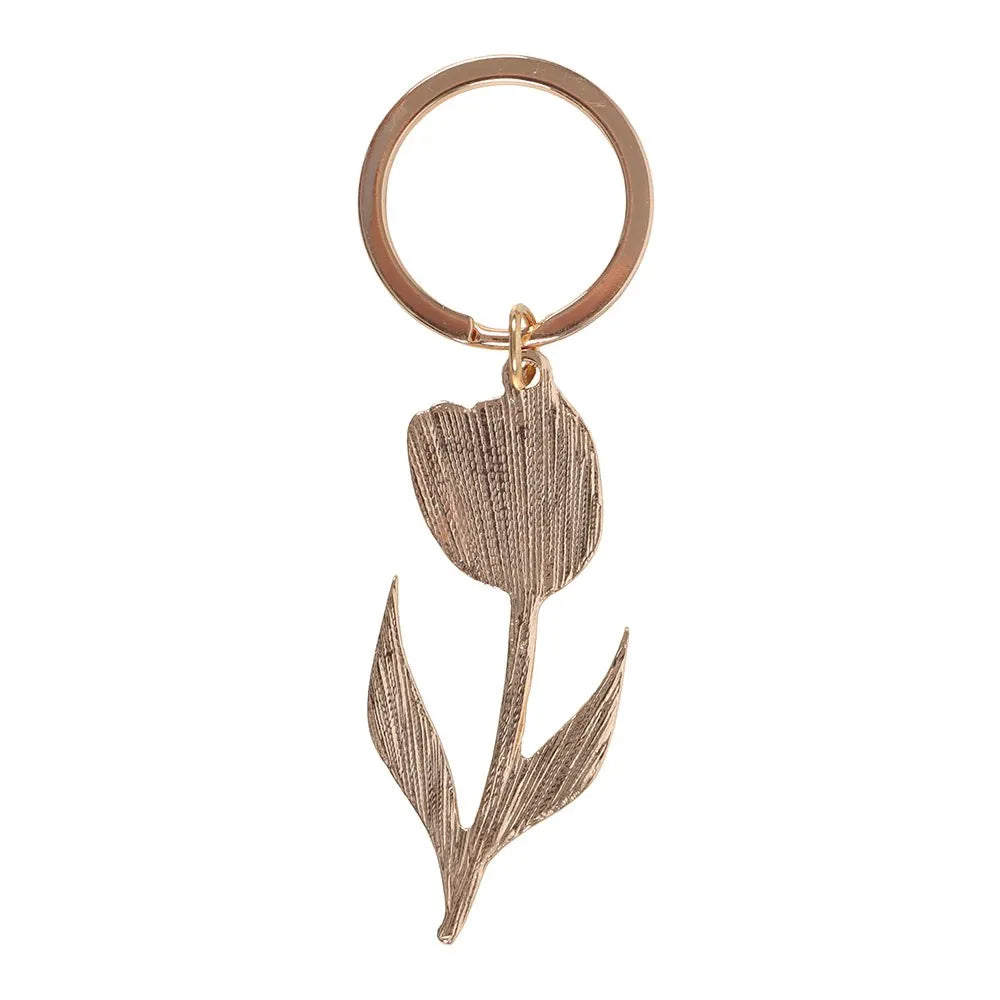 back of tulip-shaped keychain on a white background