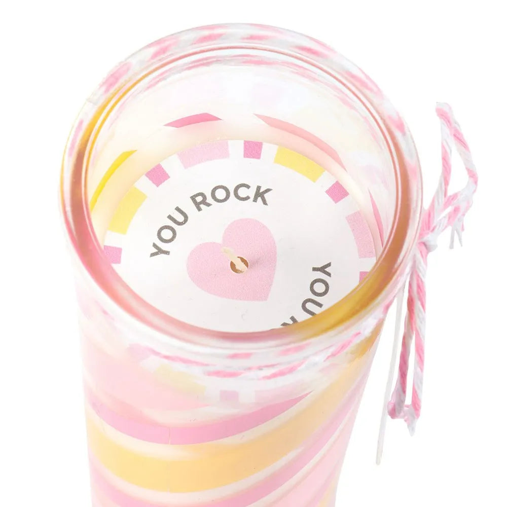 Colorful tube candle with a lid featuring 'YOU ROCK' text on a white background