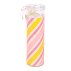 Tube candle with pink and yellow swirl design on a white background